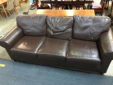 Brown leather three seater sofa