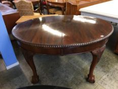 A Victorian mahogany extending dining table