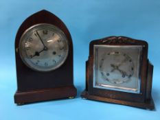 A mahogany bracket clock and an oak cased clock