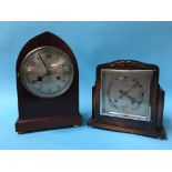 A mahogany bracket clock and an oak cased clock