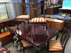 Reproduction mahogany extending dining table and eight (6+2) chairs
