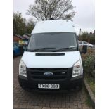 A Ford Transit, partially converted to camper van,