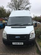 A Ford Transit, partially converted to camper van,