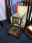 An antique child's rocking chair and a child's armchair