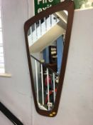 A teak framed mirror