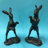 A pair of leaping hares