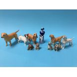 Five small Beswick dogs and a quantity of Wade