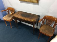 A pair of Bentwood chairs and a mahogany tea table