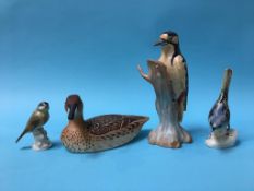 A Spode 'Greater Spotted Woodpecker', a Royal Doulton 'Pintail' and two other birds