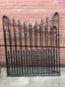 A large pair of bespoke wrought iron gates, 291cm wide, 169cm height