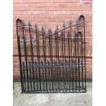 A large pair of bespoke wrought iron gates, 291cm wide, 169cm height