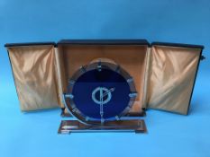 An Art Deco two colour glass and chrome clock by G