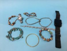 A bag of assorted jewellery etc.