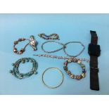 A bag of assorted jewellery etc.