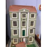 A large Georgian style dolls house (no contents), 62cm wide, 102cm high