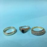 A 9ct gold ring, 3.9g and two 18ct gold rings, 8.5g