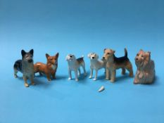 Six small Beswick dogs