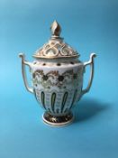 A Royal Worcester Heritage collection 2010 vase and cover, 19cm high