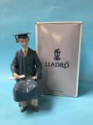 A boxed Lladro figure, 'Boy Graduate'