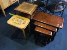 An Old Charm nest of three oak tables, an occasional table and a musical table