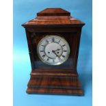 A walnut cased eight day clock, with strike action, by Anto Breger, 47cm high