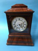 A walnut cased eight day clock, with strike action, by Anto Breger, 47cm high