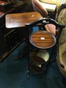 A mahogany cake stand and a mahogany tripod table