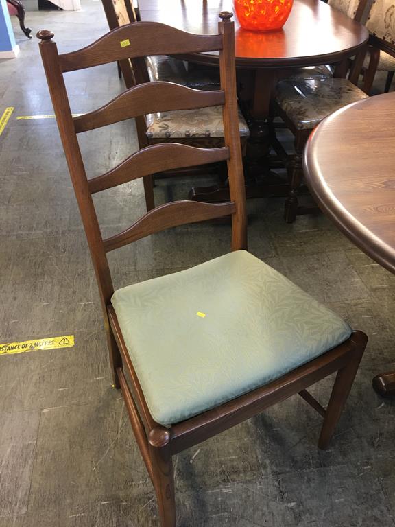 An Ercol oval dining table and four ladderback chairs - Image 2 of 2