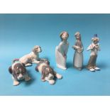Two Lladro figures, two Lladro dogs, a Nao dog and one other figure (6)
