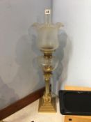 A brass Corinthian column oil lamp, with etched glass shade and reservoir