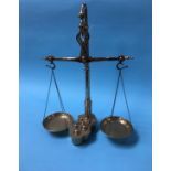A set of brass balance scales and weights