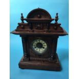 A walnut cased clock