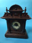 A walnut cased clock