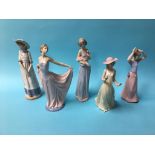 A Lladro figure of a lady holding her dress aloft and four Nao figures (5)