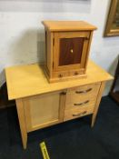 An oak side cabinet, with three drawers and a small oak wall cabinet, 89cm length