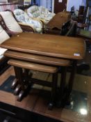 An Ercol nest of three tables