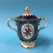 A Royal Crown Derby Limited edition, 104/200 two handled cup and cover, commemorating the marriage