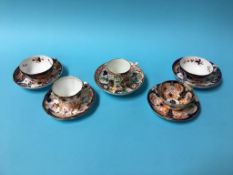 Five various Royal Crown Derby tea cups and saucers