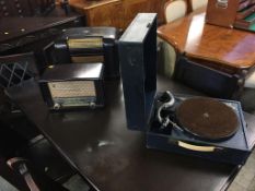 A Marconi brown Bakelite radio, a Phillips radio and an Antoria table top wind up gramophone