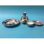 A Derby Imari pattern plate, painted marks, 21cm diameter, a porcelain tea bowl and saucer and a