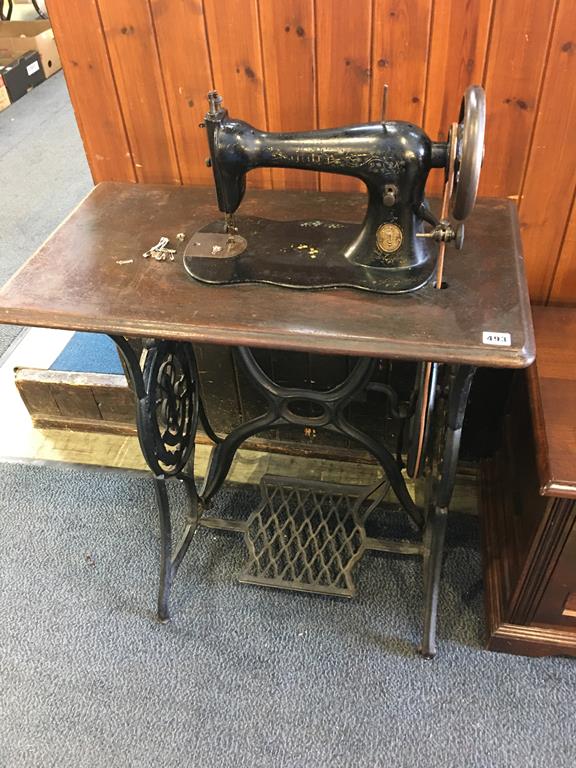 A Singer Treddle sewing machine