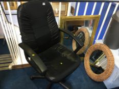 An office swivel chair and two mirrors