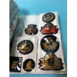 A collection of Merchant Navy badges and epaulettes