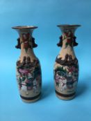 A pair of Japanese satsuma ware vases, 29cm high