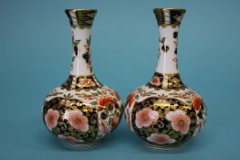 A pair of Royal Crown Derby Imari vases, painted marks, 15cm high