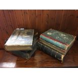A quantity of leather bound bibles and journals etc.