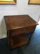 An oak single drawer side table, 61cm length