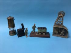 A Miners lamp and various coal mining related figures