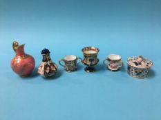 A Royal Crown Derby Imari Loving cup, 2451, a tyg, 2642, a pink ground miniature jug, 1042, 10cm