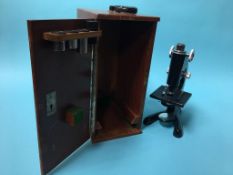 A cased Beck of London microscope